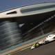 A Brawn GP car driving round the Shanghai International Circuit.